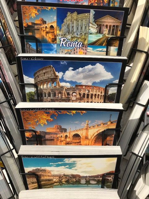 A rack of postcards in Rome