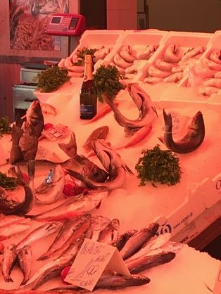 A fish seller's stand at the Ballaro Market in Palermo, Sicily.