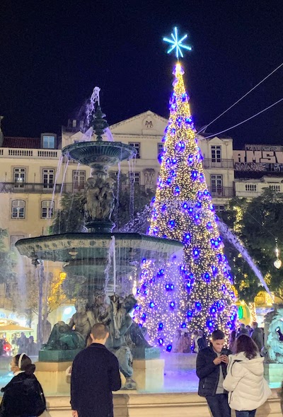 The Christmas tree and lighted fountain in Rossio Plaza, Lisbon.