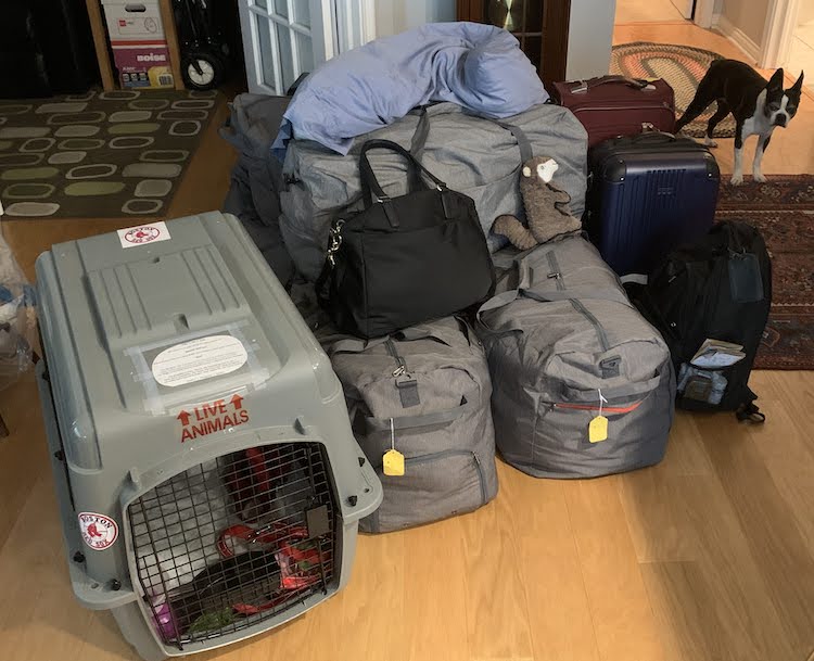 A photo of our luggage and the dog crate before we left.