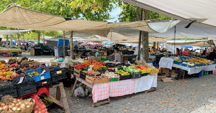 Vendor stalls at the Feira Semanal de Espinho - the weekly market fair in Espinho, Portugal.