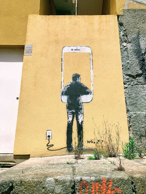 Street art by STRA in Porto, Portugal.