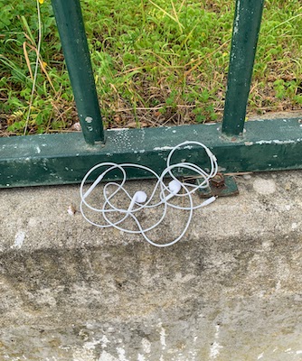 Lost earbuds on the ground