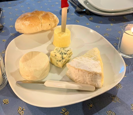 The cheese course - clockwise from top: São Jorge, brie, goat, and bleu in the middle