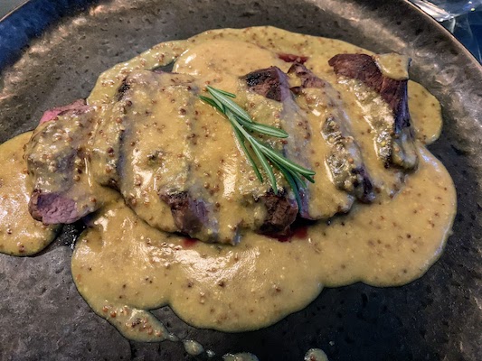 Steak with mustard and Licor Beirão sauce at P4 na Baixa in Porto