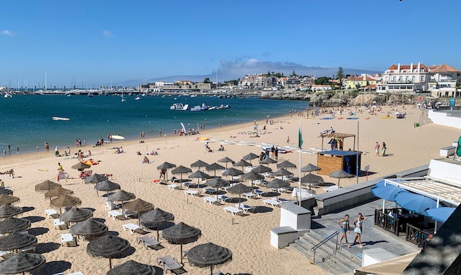 A view from above of Praia da Duquesa looking toward Praia da Ribeira de Cascais