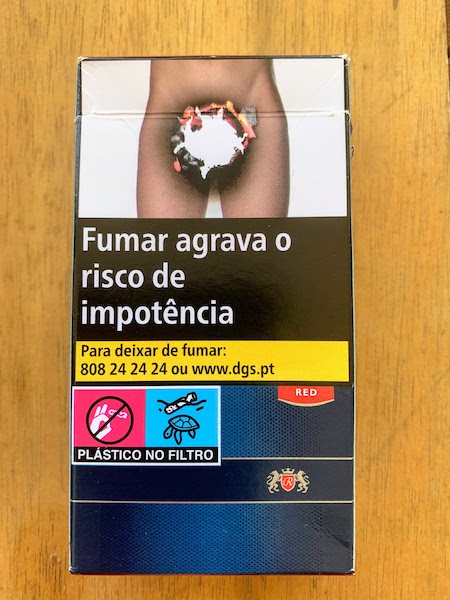 A Portuguese cigarette pack with the warning "Smoking increases the risk of impotence"