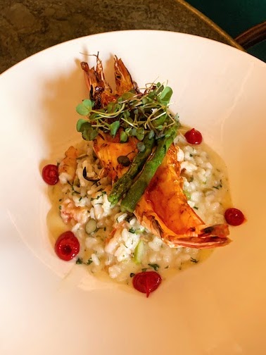 Grilled tiger prawns with shrimp risotto and asparagus with lime