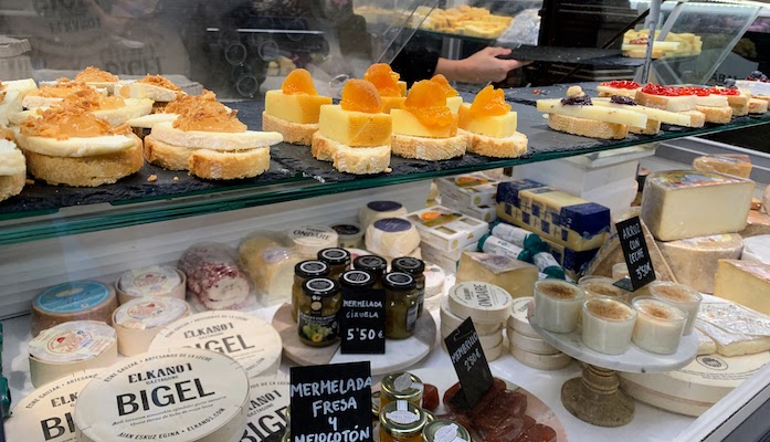 A variety of cheeses on display at the Mercado de San Miguel in Madrid.