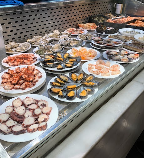 Fresh seafood on display at the Mercado de San Miguel in Madrid.