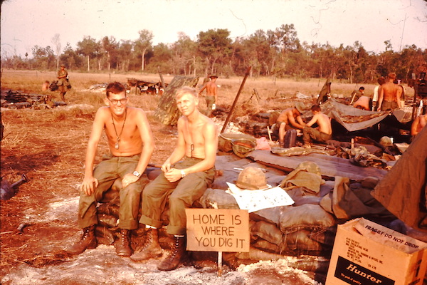 Bob and another soldier in camp