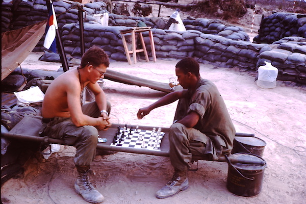 Bob and another soldier playing chess - Vietnam, ca. 1968