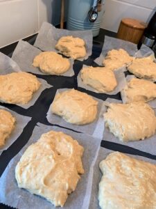 Malasada dough squares ready for the fryer.