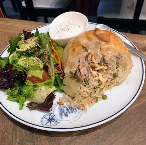 Uzi - filo pastry stuffed with basmati rice, peas, carrots, beef, and almonds - at Tayybeh in Lisbon.