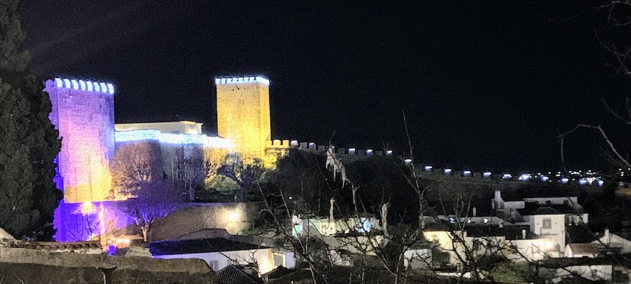 The castle at Obidos at night, lit up for the holidays, December, 2023.