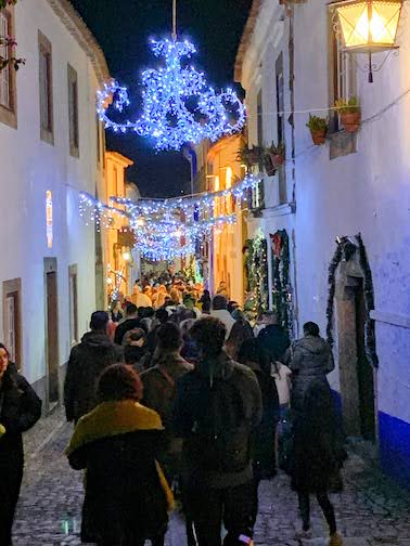 A crowded street in Obidos, Portugal, December, 2023.