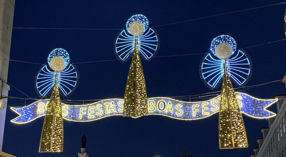 An illuminated sign welcomes you to Praça Dom Pedro IV (Rossio Square) in Lisbon, December, 2023.