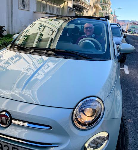 Mike at the wheel of our rental car - a Fiat 500 convertible.