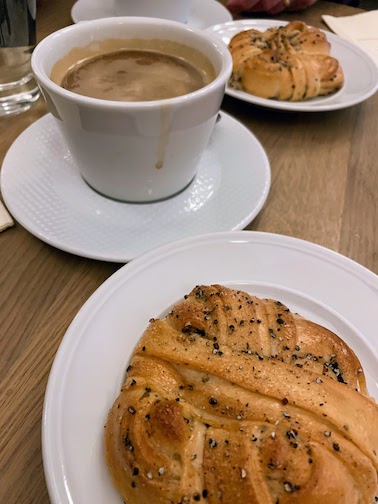 Cardamom buns and coffee during afternoon fika in Stockholm.