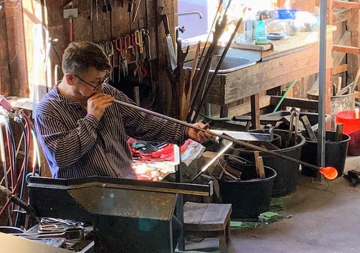 A glassblower at work at the Skansen open-air museum in Stockholm.