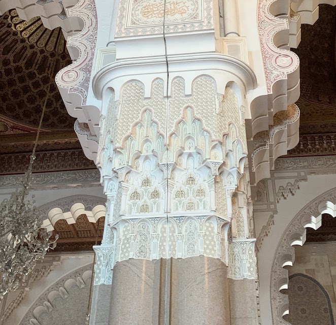 Ornate plaster work on a column in the Hassan II mosque.