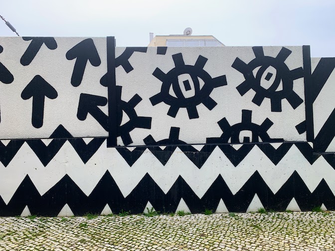 A section of wall decorated with geometric designs done by the artist Vanessa Teodoro in Lisbon.