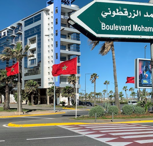 Moroccan flags flying in Casablanca, signifying that the King is in the city.