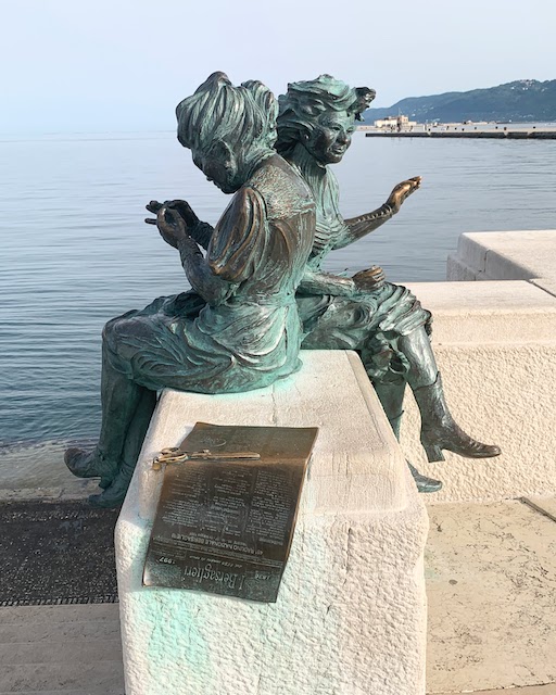 The statue "Girls of Trieste" on the Trieste waterfront.