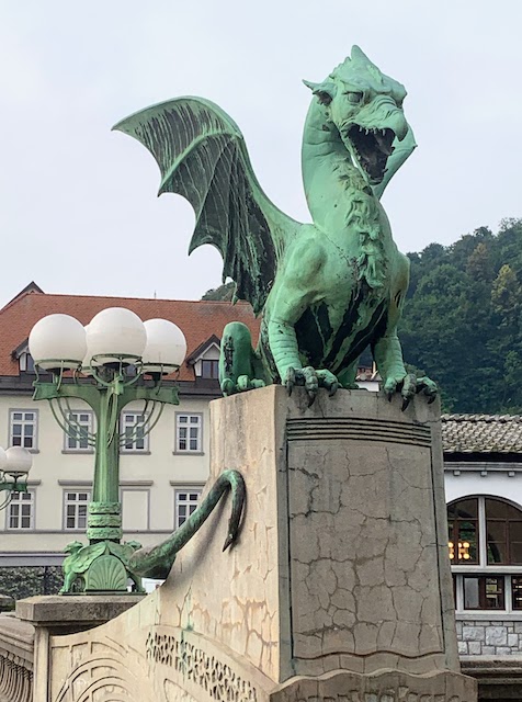 A statue on the Dragon Bridge in Ljubljana