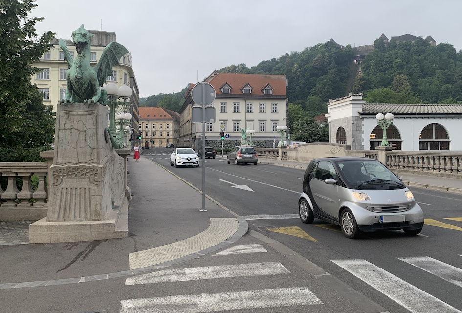 Morning traffic crossing the Dragon Bridge