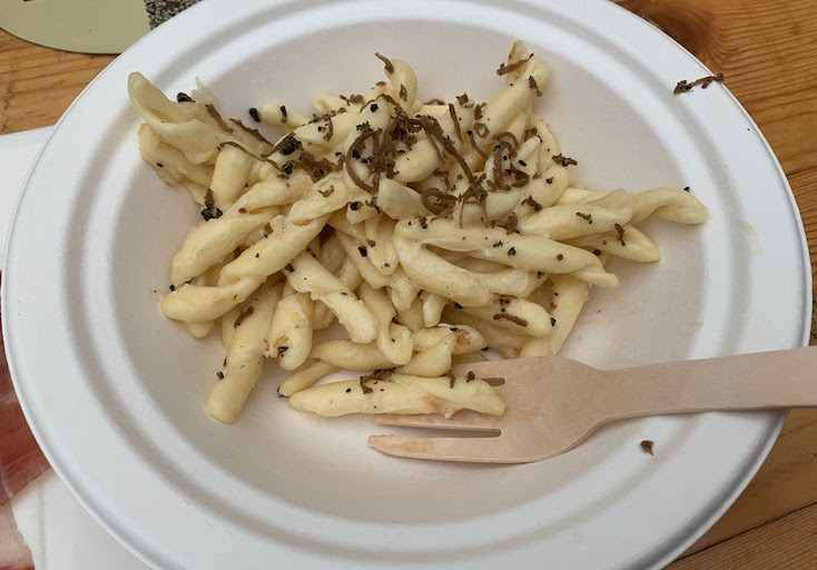 Trofie pasta with black truffle shavings