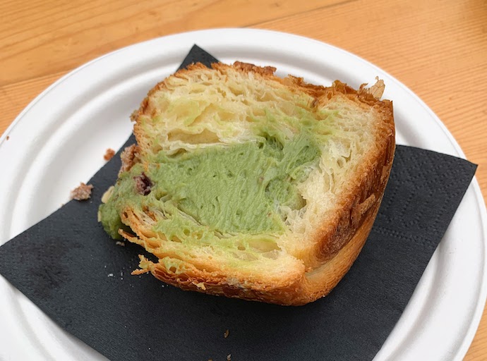 A cruffin filled with pistachio cream