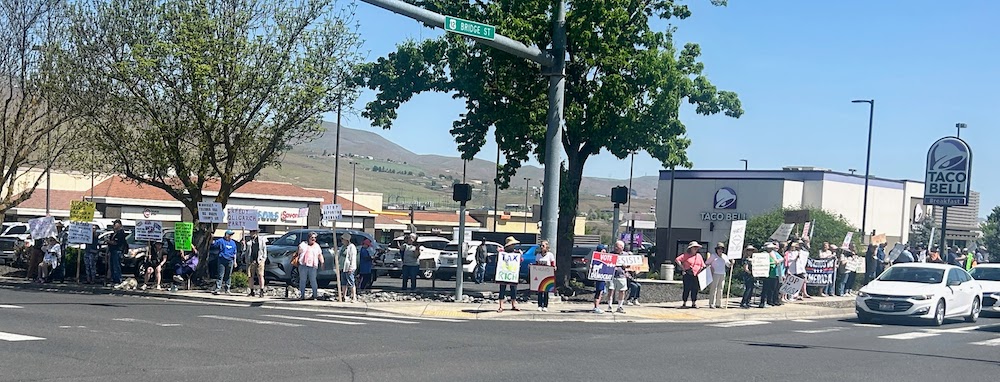 Protesters at the intersection of Bridge and 5th Streets in Clarkston, WA - May 1, 2025
