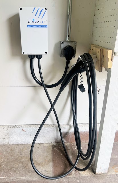 0251 - Home charger A photo of the Grizzl*E car charger installed in our garage.
