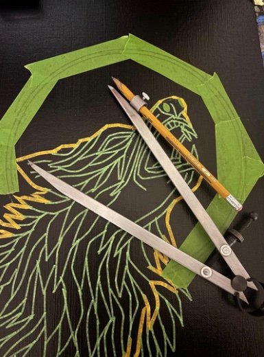 Step 5 of Polly Walker's "Stained Glass on Canvas" technique: When precise curves are needed, she uses a compass to lay out the lines on multiple pieces of wide tape.